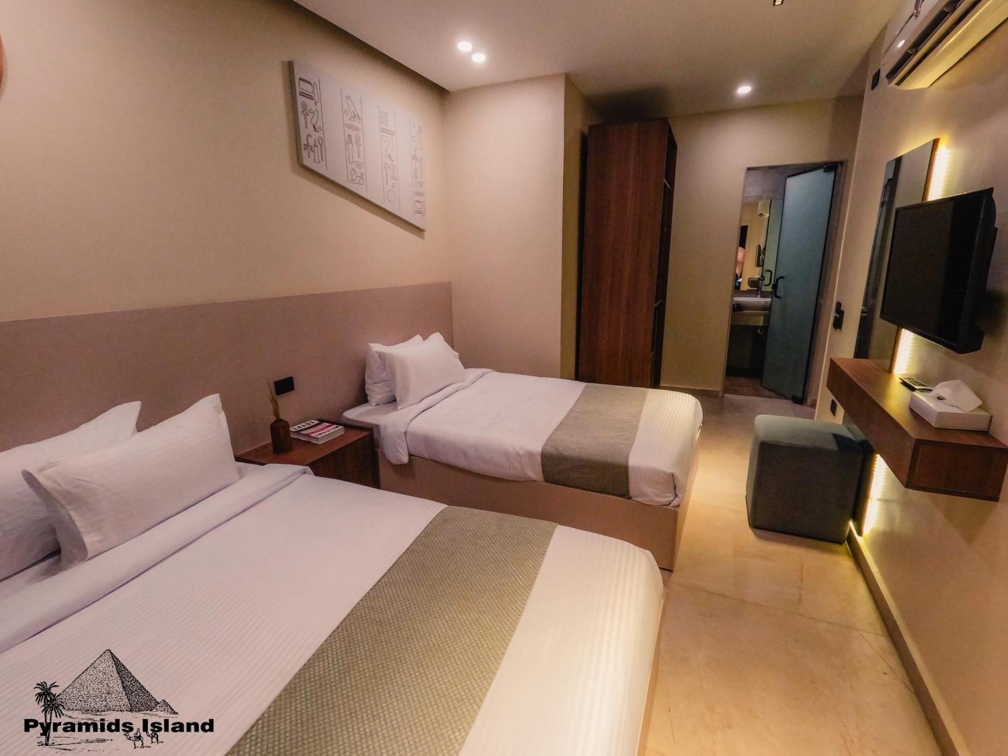 Pyramids Island Bed and Breakfast Kafret el-Gabal Exteriör bild